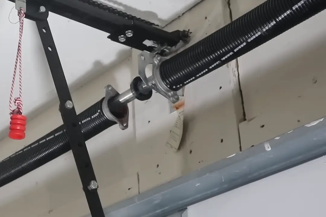 garage door spring repair in progress 1080x720 1 Garage Door Spring Replacement in Wheaton, IL is in progress